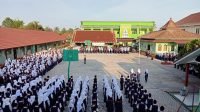 Polsek Tanjung Raja melaksanakan giat upacara di sekolah di Kecamatan Tanjung Raja Kabupaten Ogan Ilir, Senin (16/01/2023)